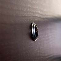 Скрытая камера наблюдения, стилизованная под обычный глазок